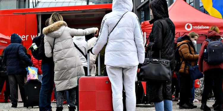 Біженці з України