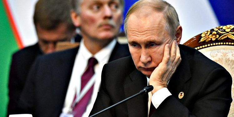 Путін.