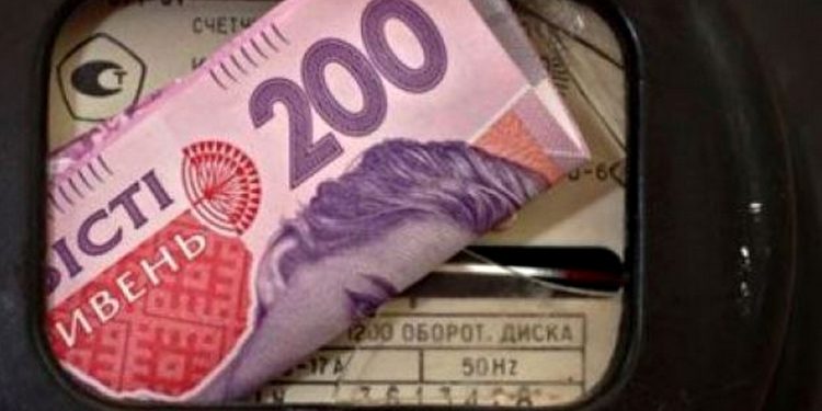 Електролічильник і гривні.