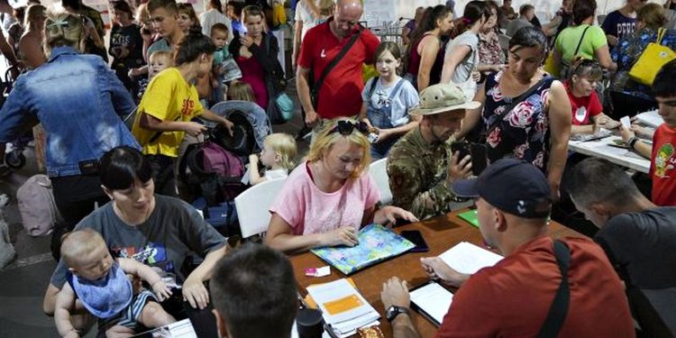 Переселенці.