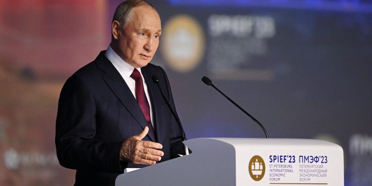 путін