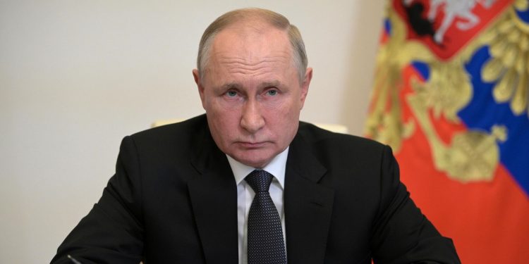 путін