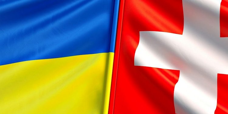 Прапори України та Швейцарії.