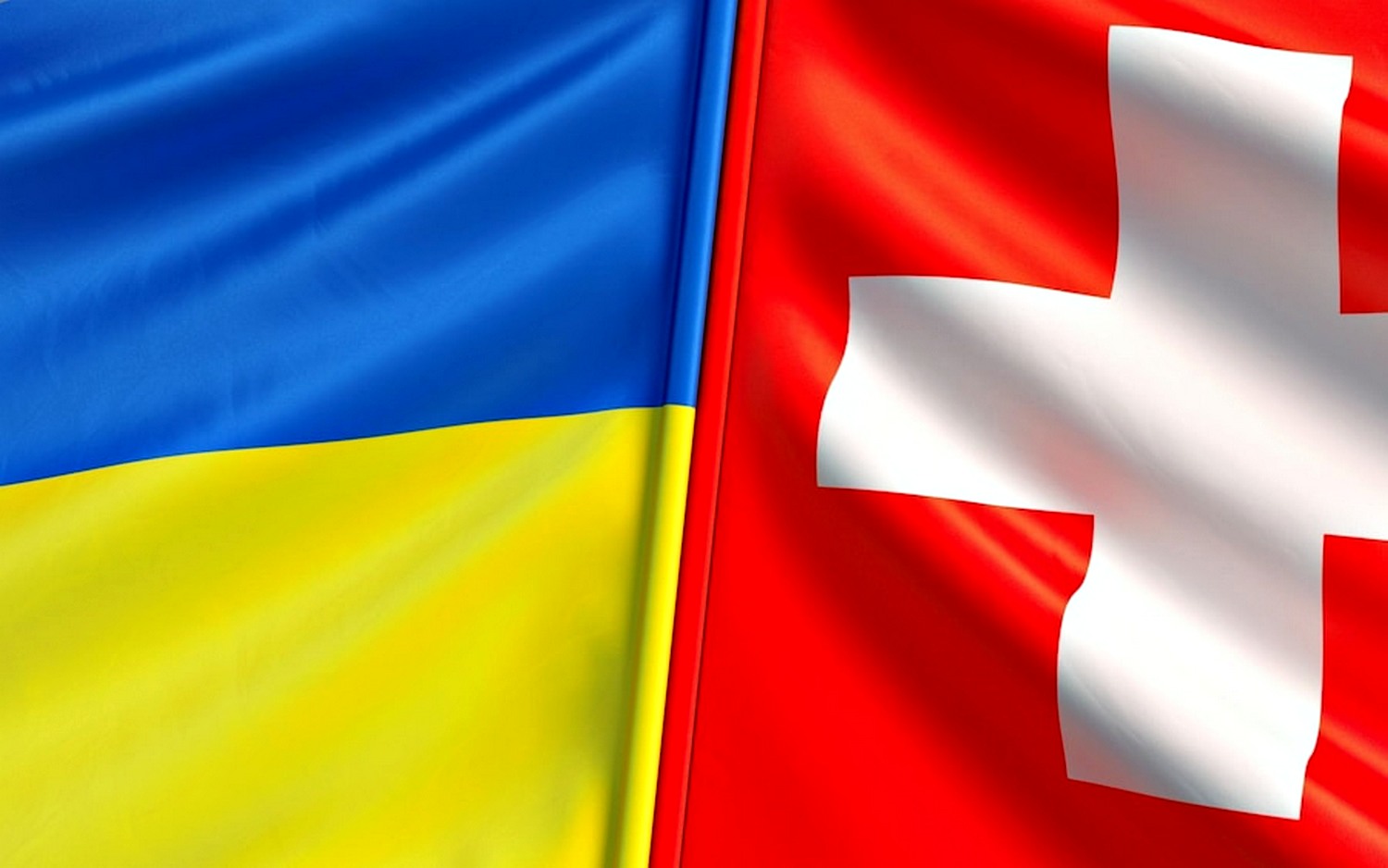 Прапори України та Швейцарії.