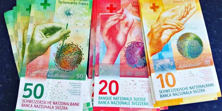 Швейцарські франки.