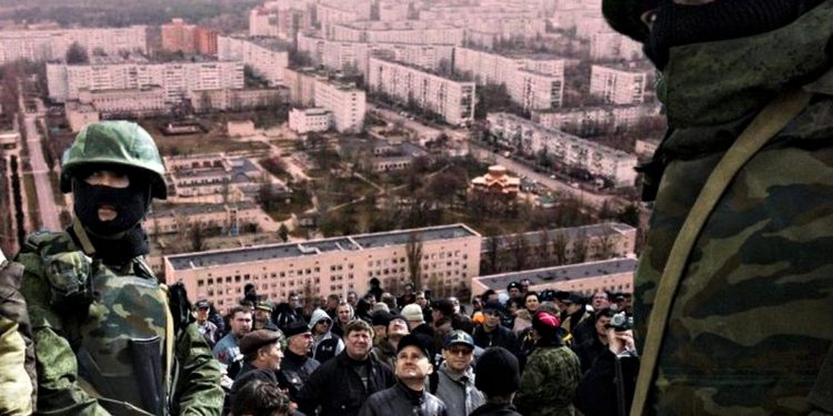 Окупанти та колаборанти.