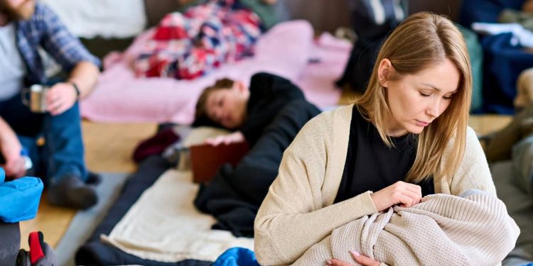 Переселенці.