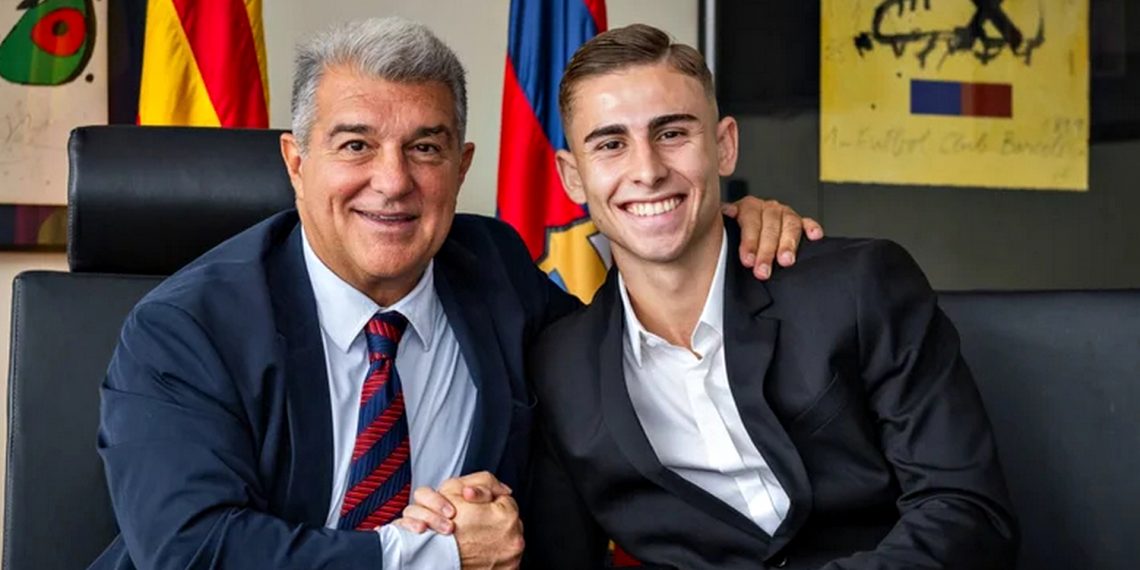 Фермін Лопес та голова ФК «Барселона».