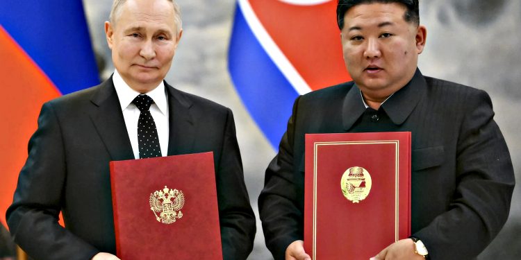 Володимир Путін і Кім Чен Ин.